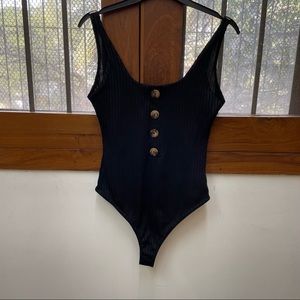 Black bodysuit from PrettyLittleThing
